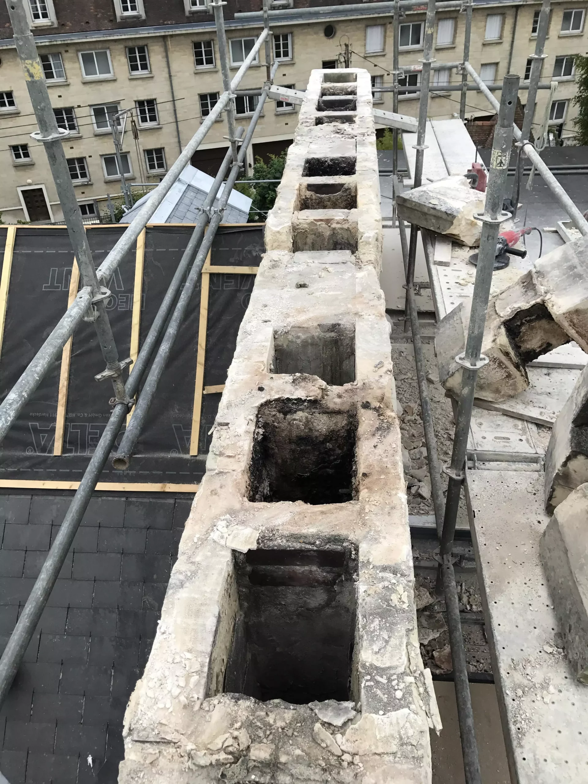 Démaçonnage de la cheminée existante