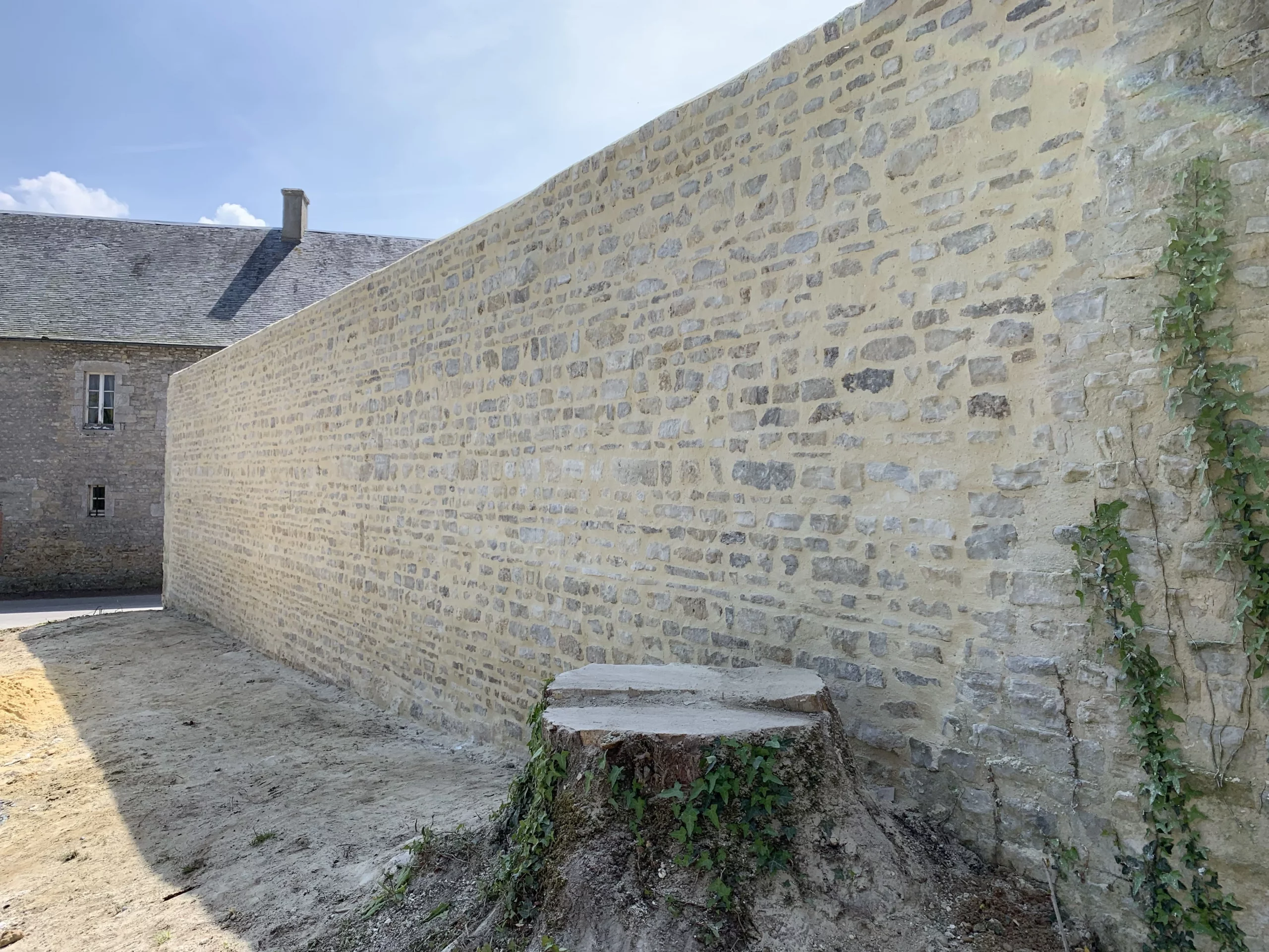 Finalisation de la reconstruction du mur